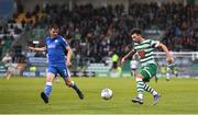 6 May 2022; Danny Mandroiu of Shamrock Rovers in action against Conor Tourish of Finn Harps during the SSE Airtricity League Premier Division match between Shamrock Rovers and Finn Harps at Tallaght Stadium in Dublin. Photo by Seb Daly/Sportsfile