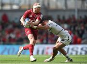 7 May 2022; Keith Earls of Munster is tackled by Pierre Fouyssac of Toulouse during the Heineken Champions Cup Quarter-Final match between Munster and Toulouse at Aviva Stadium in Dublin. Photo by Ramsey Cardy/Sportsfile