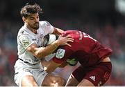7 May 2022; Damian de Allende of Munster is tackled by Romain Ntamack of Toulouse during the Heineken Champions Cup Quarter-Final match between Munster and Toulouse at Aviva Stadium in Dublin. Photo by Ramsey Cardy/Sportsfile