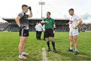 7 May 2022; Referee Martin McNally with team captains Jack Lavin of Sligo, left, and Aaron Browne of Kildare during the coin toss before EirGrid GAA Football All-Ireland U20 Championship Semi-Final match between Sligo and Kildare at Kingspan Breffni in Cavan. Photo by Seb Daly/Sportsfile