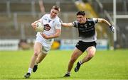 7 May 2022; Luke Killian of Kildare in action against Joseph Keaney of Sligo during the EirGrid GAA Football All-Ireland U20 Championship Semi-Final match between Sligo and Kildare at Kingspan Breffni in Cavan. Photo by Seb Daly/Sportsfile