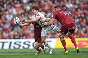 7 May 2022; Antoine Dupont of Toulouse is tackled by Jeremy Loughman, left, and Jason Jenkins of Munster during the Heineken Champions Cup Quarter-Final match between Munster and Toulouse at Aviva Stadium in Dublin. Photo by Ramsey Cardy/Sportsfile