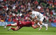 7 May 2022; Baptiste Germain of Toulouse is tackled by Ben Healy of Munster during the Heineken Champions Cup Quarter-Final match between Munster and Toulouse at Aviva Stadium in Dublin. Photo by Brendan Moran/Sportsfile