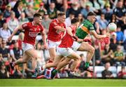 7 May 2022; David Clifford of Kerry in action against Cork players, from left, Kevin Flahive, Steven Sherlock and Sean Powter during the Munster GAA Football Senior Championship Semi-Final match between Cork and Kerry at Páirc Ui Rinn in Cork. Photo by Stephen McCarthy/Sportsfile