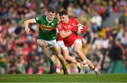 7 May 2022; Sean Powter of Cork in action against Diarmuid O’Connor of Kerry during the Munster GAA Football Senior Championship Semi-Final match between Cork and Kerry at Páirc Ui Rinn in Cork. Photo by Stephen McCarthy/Sportsfile
