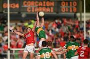 7 May 2022; David Moran of Kerry in action against Colm O’Callaghan of Cork during the Munster GAA Football Senior Championship Semi-Final match between Cork and Kerry at Páirc Ui Rinn in Cork. Photo by Stephen McCarthy/Sportsfile