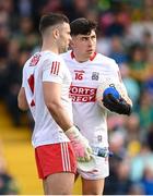 7 May 2022; Dylan Foley of Cork speaks to Micheál Aodh Martin, left, as he comes onto the pitch during a first half substitution during the Munster GAA Football Senior Championship Semi-Final match between Cork and Kerry at Páirc Ui Rinn in Cork. Photo by Stephen McCarthy/Sportsfile