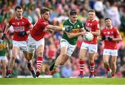 7 May 2022; Graham O’Sullivan of Kerry in action against Ian Maguire of Cork during the Munster GAA Football Senior Championship Semi-Final match between Cork and Kerry at Páirc Ui Rinn in Cork. Photo by Stephen McCarthy/Sportsfile