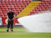 29 April 2022; Bernard Collum, member of the Sligo County Fire Brigade, waters the pitch before the SSE Airtricity League Premier Division match between Sligo Rovers and Shamrock Rovers at The Showgrounds in Sligo. Photo by Piaras Ó Mídheach/Sportsfile