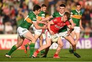 7 May 2022; John Cooper of Cork in action against David Moran, left, and Seán O’Shea of Kerry during the Munster GAA Football Senior Championship Semi-Final match between Cork and Kerry at Páirc Ui Rinn in Cork. Photo by Stephen McCarthy/Sportsfile