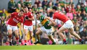 7 May 2022; Graham O’Sullivan of Kerry is tackled by Maurice Shanley of Cork during the Munster GAA Football Senior Championship Semi-Final match between Cork and Kerry at Páirc Ui Rinn in Cork. Photo by Stephen McCarthy/Sportsfile