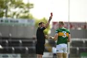 8 May 2022; Referee Anthony Nolan mistakenly shows Alan Dineen of Kerry a red card before showing him a black card during the EirGrid GAA Football All-Ireland U20 Championship Semi-Final match between Kerry and Tyrone at MW Hire O'Moore Park in Portlaoise, Laois. Photo by Harry Murphy/Sportsfile