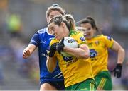 8 May 2022; Yvonne Bonnar of Donegal is tackled by Shauna Lynch of Cavan during the Ulster Ladies Football Senior Championship Semi-Final match between Cavan and Donegal at St Tiernach's Park in Clones, Monaghan. Photo by Piaras Ó Mídheach/Sportsfile