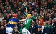8 May 2022; Tom Morrisey of Limerick is tackled by Dillon Quirke of Tipperary during the Munster GAA Hurling Senior Championship Round 3 match between Limerick and Tipperary at TUS Gaelic Grounds in Limerick. Photo by Ray McManus/Sportsfile