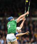 8 May 2022; Mike Casey of Limerick in action against Paul Flynn of Tipperary during the Munster GAA Hurling Senior Championship Round 3 match between Limerick and Tipperary at TUS Gaelic Grounds in Limerick. Photo by Stephen McCarthy/Sportsfile