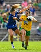 8 May 2022; Geraldine McLaughlin of Donegal gets away from Zara Fay of Cavan during the Ulster Ladies Football Senior Championship Semi-Final match between Cavan and Donegal at St Tiernach's Park in Clones, Monaghan. Photo by Piaras Ó Mídheach/Sportsfile