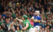 8 May 2022; Paul Flynn of Tipperary in action against Sean Finn of Limerick during the Munster GAA Hurling Senior Championship Round 3 match between Limerick and Tipperary at TUS Gaelic Grounds in Limerick. Photo by Stephen McCarthy/Sportsfile