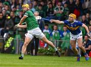 8 May 2022; Tom Morrisey of Limerick is hooked by Conor Stakelum of Tipperary  during the Munster GAA Hurling Senior Championship Round 3 match between Limerick and Tipperary at TUS Gaelic Grounds in Limerick. Photo by Ray McManus/Sportsfile
