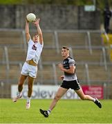 7 May 2022; Tommy Gill of Kildare in action against Féidhlim O’Donnell of Sligo during the EirGrid GAA Football All-Ireland U20 Championship Semi-Final match between Sligo and Kildare at Kingspan Breffni in Cavan. Photo by Seb Daly/Sportsfile