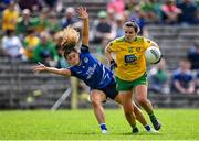8 May 2022; Geraldine McLaughlin of Donegal gets away from Zara Fay of Cavan during the Ulster Ladies Football Senior Championship Semi-Final match between Cavan and Donegal at St Tiernach's Park in Clones, Monaghan. Photo by Piaras Ó Mídheach/Sportsfile