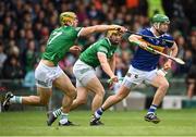 8 May 2022; Noel McGrath of Tipperary in action against Dan Morrisey, left, and Tom Morrisey of Limerick during the Munster GAA Hurling Senior Championship Round 3 match between Limerick and Tipperary at TUS Gaelic Grounds in Limerick. Photo by Stephen McCarthy/Sportsfile