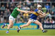 8 May 2022; Paul Flynn of Tipperary in action against Graeme Mulcahy of Limerick during the Munster GAA Hurling Senior Championship Round 3 match between Limerick and Tipperary at TUS Gaelic Grounds in Limerick. Photo by Stephen McCarthy/Sportsfile
