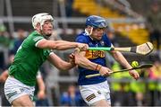 8 May 2022; Conor Bowe of Tipperary is tackled by Kyle Hayes of Limerick during the Munster GAA Hurling Senior Championship Round 3 match between Limerick and Tipperary at TUS Gaelic Grounds in Limerick. Photo by Ray McManus/Sportsfile