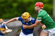 8 May 2022; Mark Kehoe of Tipperary is tackled by Barry Nash of Limerick during the Munster GAA Hurling Senior Championship Round 3 match between Limerick and Tipperary at TUS Gaelic Grounds in Limerick. Photo by Ray McManus/Sportsfile