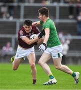 8 May 2022; Finnian Ó Laoí of Galway is tackled by Shane Quinn of Leitrim during the Connacht GAA Football Senior Championship Semi-Final match between Galway and Leitrim at Pearse Stadium in Galway. Photo by Brendan Moran/Sportsfile