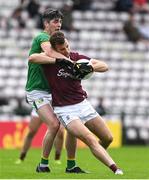 8 May 2022; Paul Conroy of Galway is tackled by Pearce Dolan of Leitrim during the Connacht GAA Football Senior Championship Semi-Final match between Galway and Leitrim at Pearse Stadium in Galway. Photo by Brendan Moran/Sportsfile