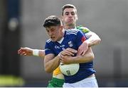8 May 2022; James Smith of Cavan in action against Caolan Ward of Donegal during the Ulster GAA Football Senior Championship Semi-Final match between Cavan and Donegal at St Tiernach's Park in Clones, Monaghan. Photo by Piaras Ó Mídheach/Sportsfile