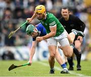 8 May 2022; Tom Morrisey of Limerick is tackled by Robert Byrne of Tipperary during the Munster GAA Hurling Senior Championship Round 3 match between Limerick and Tipperary at TUS Gaelic Grounds in Limerick. Photo by Stephen McCarthy/Sportsfile