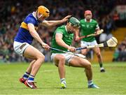 8 May 2022; Sean Finn of Limerick is tackled by Mark Kehoe of Tipperary during the Munster GAA Hurling Senior Championship Round 3 match between Limerick and Tipperary at TUS Gaelic Grounds in Limerick. Photo by Ray McManus/Sportsfile
