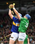 8 May 2022; Conor Bowe of Tipperary is tackled by Mike Casey of Limerick during the Munster GAA Hurling Senior Championship Round 3 match between Limerick and Tipperary at TUS Gaelic Grounds in Limerick. Photo by Ray McManus/Sportsfile