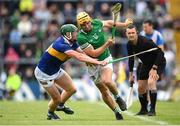 8 May 2022; Tom Morrisey of Limerick is tackled by Robert Byrne of Tipperary during the Munster GAA Hurling Senior Championship Round 3 match between Limerick and Tipperary at TUS Gaelic Grounds in Limerick. Photo by Stephen McCarthy/Sportsfile
