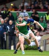 8 May 2022; Sean Finn of Limerick is tackled by Conor Bowe of Tipperary during the Munster GAA Hurling Senior Championship Round 3 match between Limerick and Tipperary at TUS Gaelic Grounds in Limerick. Photo by Ray McManus/Sportsfile