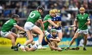 8 May 2022; Noel McGrath of Tipperary in action against Limerick players, from left, Darragh O'Donovan, Gearoid Hegarty, 10, and Dan Morrisey during the Munster GAA Hurling Senior Championship Round 3 match between Limerick and Tipperary at TUS Gaelic Grounds in Limerick. Photo by Stephen McCarthy/Sportsfile