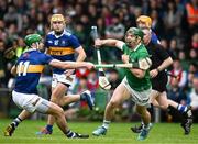 8 May 2022; Sean Finn of Limerick is tackled by Noel McGrath of Tipperary during the Munster GAA Hurling Senior Championship Round 3 match between Limerick and Tipperary at TUS Gaelic Grounds in Limerick. Photo by Ray McManus/Sportsfile