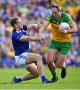 8 May 2022; Michael Murphy of Donegal gets past Padraig Faulkner of Cavan during the Ulster GAA Football Senior Championship Semi-Final match between Cavan and Donegal at St Tiernach's Park in Clones, Monaghan. Photo by Piaras Ó Mídheach/Sportsfile