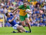 8 May 2022; Michael Murphy of Donegal gets past Padraig Faulkner of Cavan during the Ulster GAA Football Senior Championship Semi-Final match between Cavan and Donegal at St Tiernach's Park in Clones, Monaghan. Photo by Piaras Ó Mídheach/Sportsfile