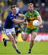 8 May 2022; Stephen McMenamin of Donegal in action against Jason McLoughlin of Cavan during the Ulster GAA Football Senior Championship Semi-Final match between Cavan and Donegal at St Tiernach's Park in Clones, Monaghan. Photo by Piaras Ó Mídheach/Sportsfile