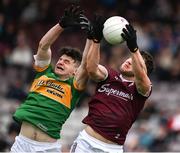 8 May 2022; Damien Comer of Galway catches the ball ahead of Donal Casey of Leitrim during the Connacht GAA Football Senior Championship Semi-Final match between Galway and Leitrim at Pearse Stadium in Galway. Photo by Brendan Moran/Sportsfile