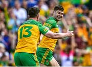 8 May 2022; Conor O'Donnell of Donegal, right, celebrates with teammate Patrick McBrearty after scoring their side's first goal during the Ulster GAA Football Senior Championship Semi-Final match between Cavan and Donegal at St Tiernach's Park in Clones, Monaghan. Photo by Piaras Ó Mídheach/Sportsfile