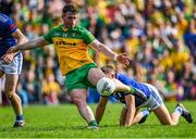 8 May 2022; Patrick McBrearty of Donegal shoots to score his side's second goal, under pressure from Killian Clarke of Cavan, during the Ulster GAA Football Senior Championship Semi-Final match between Cavan and Donegal at St Tiernach's Park in Clones, Monaghan. Photo by Piaras Ó Mídheach/Sportsfile