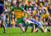 8 May 2022; Patrick McBrearty of Donegal shoots to score his side's second goal, under pressure from Killian Clarke of Cavan, during the Ulster GAA Football Senior Championship Semi-Final match between Cavan and Donegal at St Tiernach's Park in Clones, Monaghan. Photo by Piaras Ó Mídheach/Sportsfile