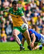 8 May 2022; Patrick McBrearty of Donegal shoots to score his side's second goal, under pressure from Killian Clarke of Cavan, during the Ulster GAA Football Senior Championship Semi-Final match between Cavan and Donegal at St Tiernach's Park in Clones, Monaghan. Photo by Piaras Ó Mídheach/Sportsfile