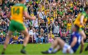 8 May 2022; Donegal supporters celebrate their side's first goal, scored by Conor O'Donnell, not pictured, during the Ulster GAA Football Senior Championship Semi-Final match between Cavan and Donegal at St Tiernach's Park in Clones, Monaghan. Photo by Piaras Ó Mídheach/Sportsfile