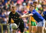 8 May 2022; Donegal goalkeeper Shaun Patton in action against Cormac O'Reilly of Cavan during the Ulster GAA Football Senior Championship Semi-Final match between Cavan and Donegal at St Tiernach's Park in Clones, Monaghan. Photo by Piaras Ó Mídheach/Sportsfile