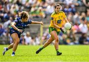 8 May 2022; Geraldine McLaughlin of Donegal in action against Zara Fay of Cavan during the Ulster Ladies Football Senior Championship Semi-Final match between Cavan and Donegal at St Tiernach's Park in Clones, Monaghan. Photo by Piaras Ó Mídheach/Sportsfile