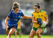 8 May 2022; Geraldine McLaughlin of Donegal in action against Zara Fay of Cavan during the Ulster Ladies Football Senior Championship Semi-Final match between Cavan and Donegal at St Tiernach's Park in Clones, Monaghan. Photo by Piaras Ó Mídheach/Sportsfile